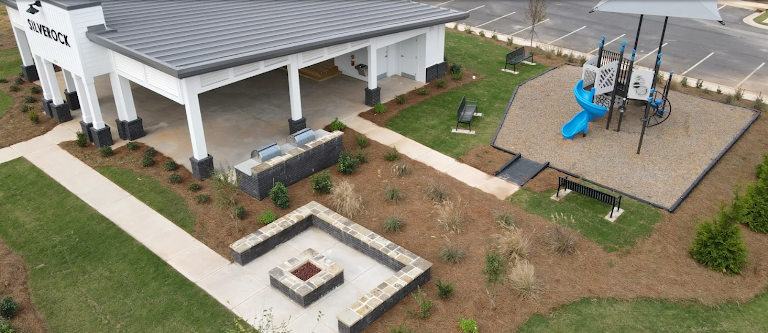 Aerial view of Silverock Pavilion — event venue with covered pavilion, lawn, and fire pit